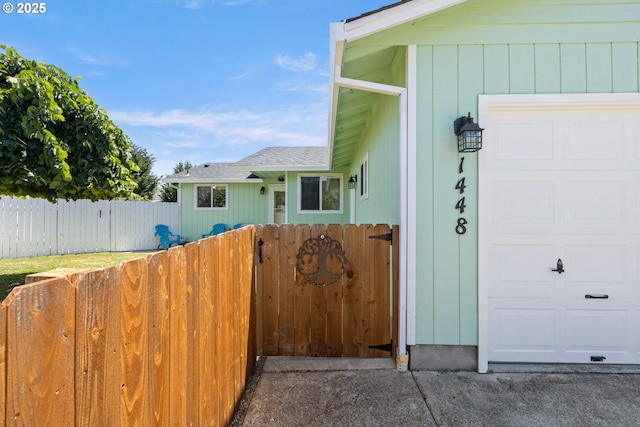 1448 S Grove Lane Ct, Sutherlin, OR 97479 - doorway to property featuring a shingled roof and a garage