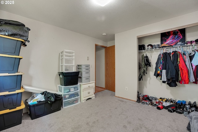 unfurnished bedroom featuring a closet and carpet flooring