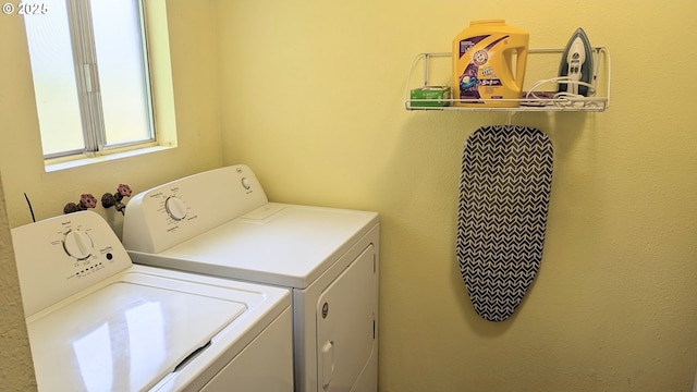 laundry area featuring laundry area and washer and dryer