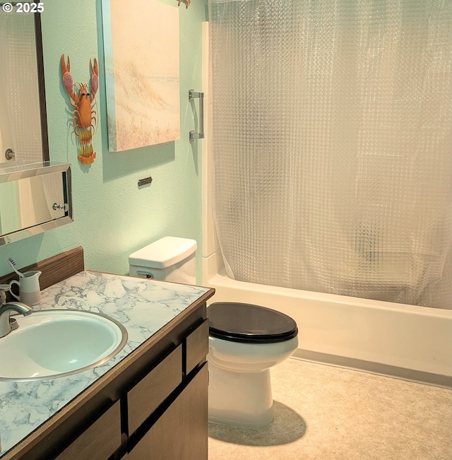 bathroom with vanity, a textured wall, toilet, and shower / bath combination with curtain
