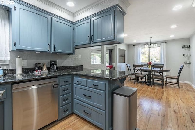 1216 Montgomery Pl NE, Albany, OR 97321 - kitchen featuring stainless steel dishwasher, healthy amount of natural light, light wood finished floors, dark stone countertops, and recessed lighting