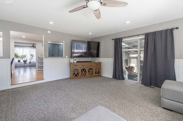 1216 Montgomery Pl NE, Albany, OR 97321 - living area featuring a wainscoted wall, ceiling fan, carpet, and recessed lighting