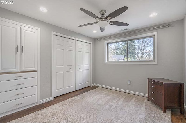 1216 Montgomery Pl NE, Albany, OR 97321 - unfurnished bedroom featuring wood finished floors, baseboards, a ceiling fan, a closet, and recessed lighting