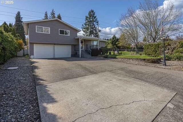 1216 Montgomery Pl NE, Albany, OR 97321 - view of front of home with driveway and an attached garage