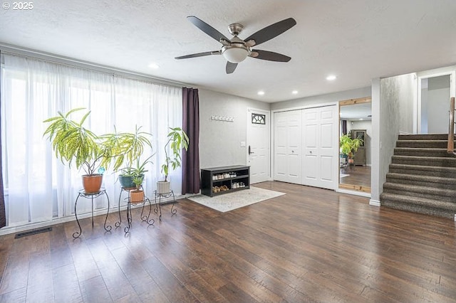 1216 Montgomery Pl NE, Albany, OR 97321 - living area featuring stairs, a ceiling fan, hardwood / wood-style floors, and recessed lighting