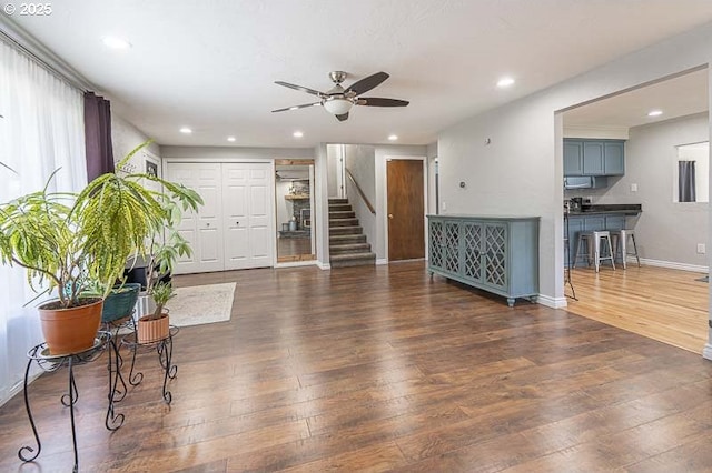1216 Montgomery Pl NE, Albany, OR 97321 - living area featuring a ceiling fan, stairway, hardwood / wood-style floors, baseboards, and recessed lighting