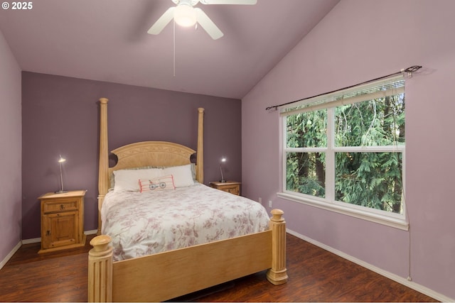 bedroom with baseboards, lofted ceiling, dark wood-style floors, and a ceiling fan