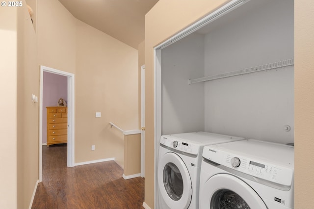 laundry room featuring washing machine and clothes dryer, laundry area, baseboards, and dark wood-style flooring