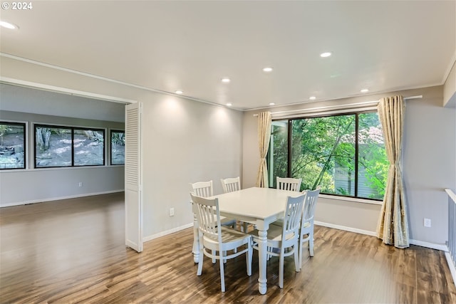 dining space featuring light wood-type flooring