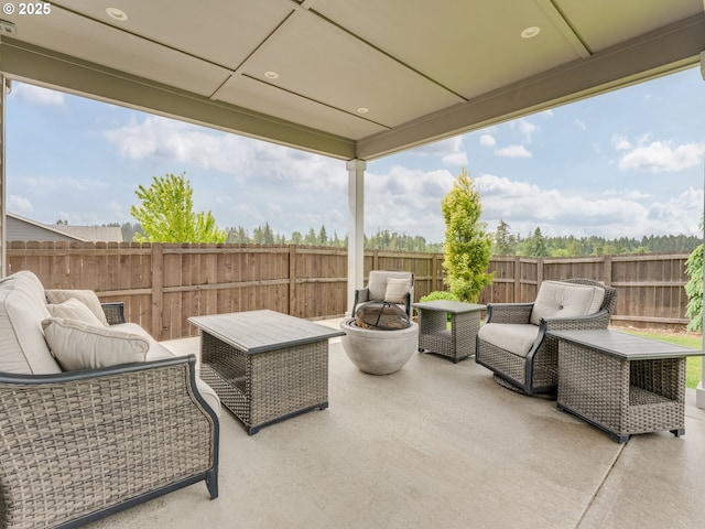 1703 S Farm View Loop, Ridgefield, WA 98642 - fenced backyard featuring a patio and outdoor lounge area