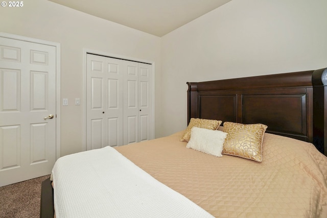 carpeted bedroom featuring a closet