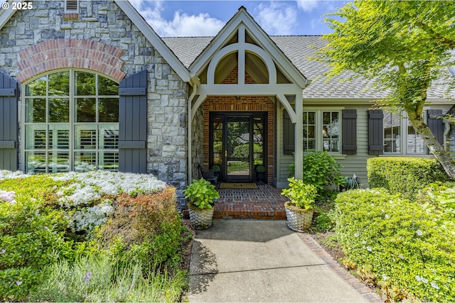 2943 Riverwalk Loop, Eugene, OR 97401 - doorway to property with roof with shingles and board and batten siding
