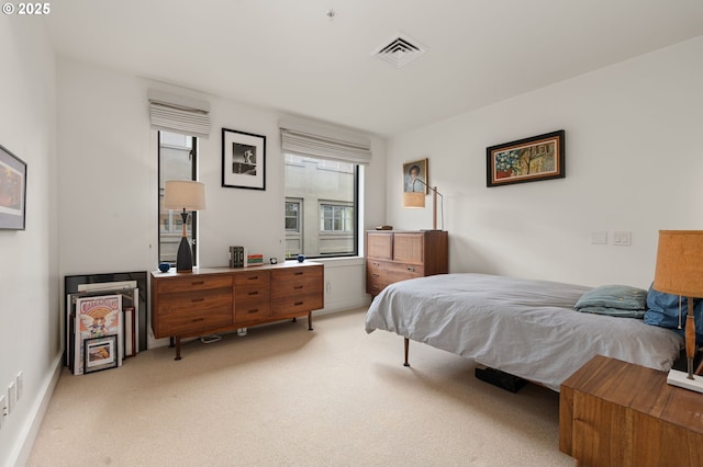 311 NW 12th Ave Unit 603, Portland, OR 97209 - bedroom featuring light colored carpet and visible vents
