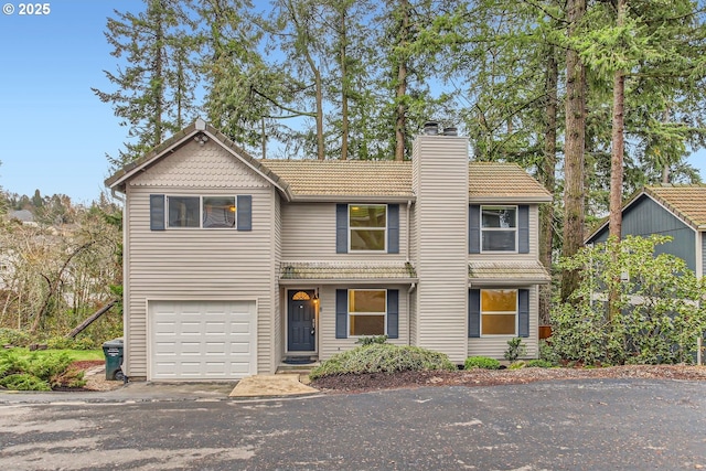 view of front of home with a garage