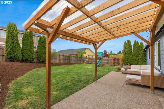 view of patio / terrace with a playground, a pergola, an outdoor living space, and a fenced backyard