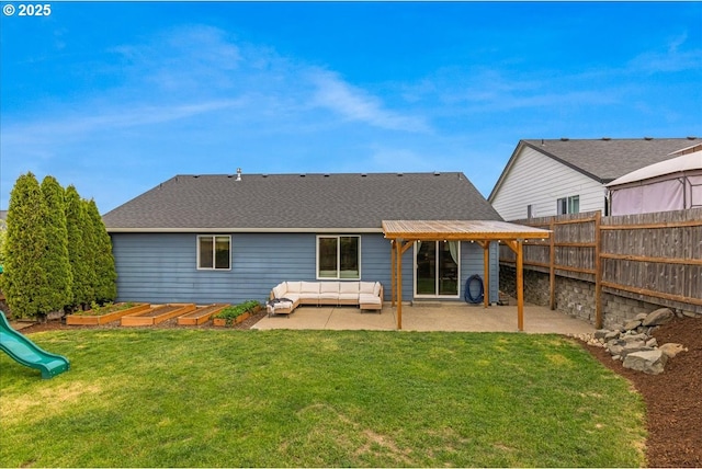 rear view of property featuring a pergola, an outdoor hangout area, a fenced backyard, a lawn, and a patio