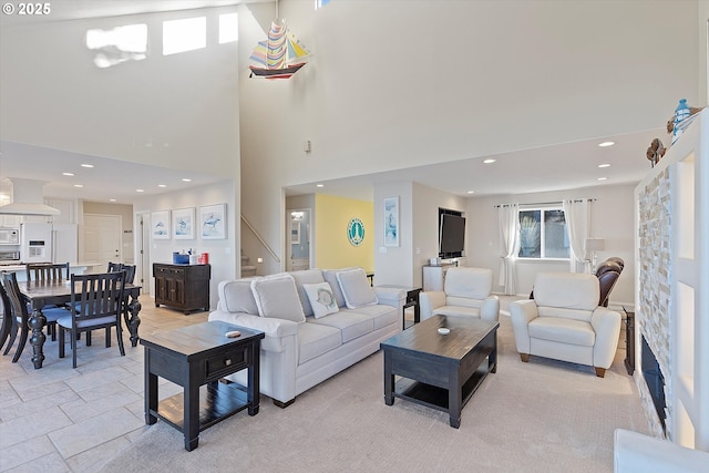 living room featuring a high ceiling