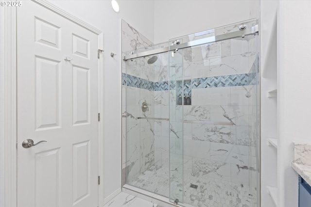 bathroom featuring vanity and walk in shower