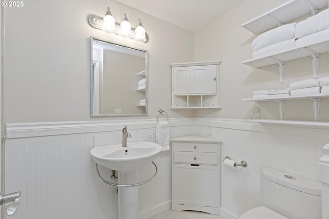 bathroom with sink and toilet