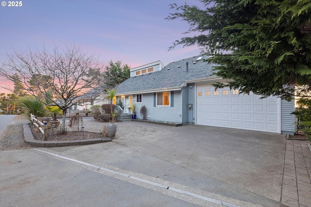 view of front of home with a garage