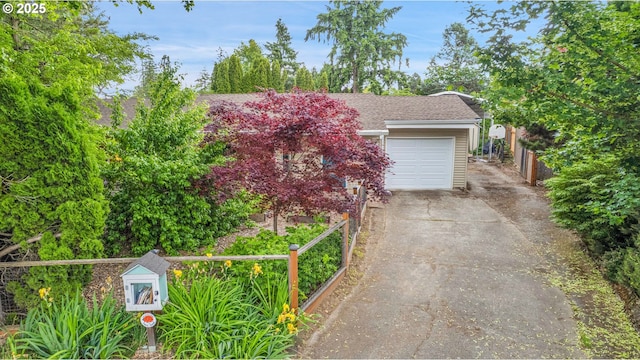 6410 SW 204th Pl, Beaverton, OR 97078 - obstructed view of property featuring driveway and an attached garage