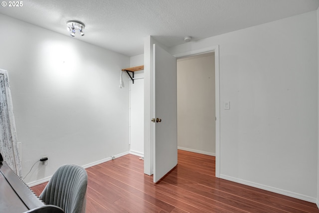 6410 SW 204th Pl, Beaverton, OR 97078 - home office featuring wood finished floors and a textured ceiling