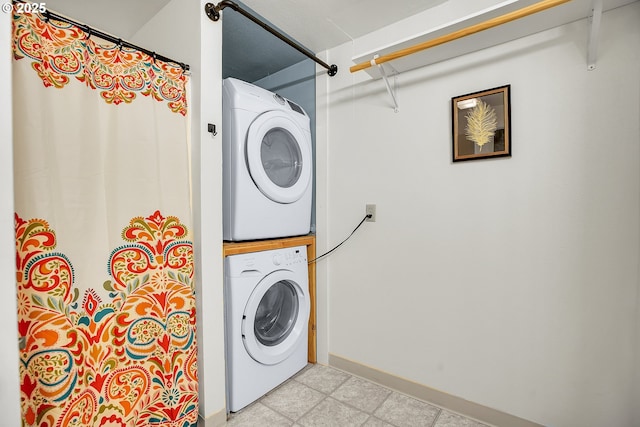 6410 SW 204th Pl, Beaverton, OR 97078 - laundry area featuring estacked washer and dryer and baseboards