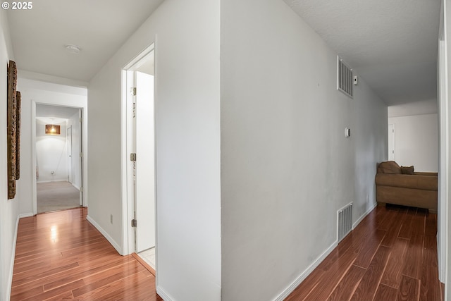6410 SW 204th Pl, Beaverton, OR 97078 - hallway featuring wood finished floors and baseboards