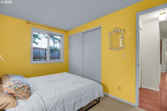 6410 SW 204th Pl, Beaverton, OR 97078 - bedroom with a closet and wood finished floors