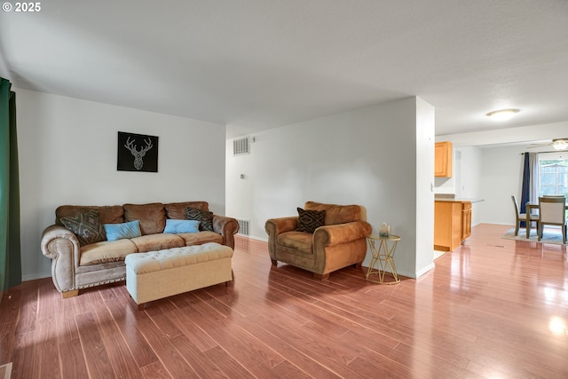 6410 SW 204th Pl, Beaverton, OR 97078 - living area with wood finished floors