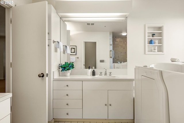 616 NW Westover Ter, Portland, OR 97210 - bathroom featuring vanity and a bath