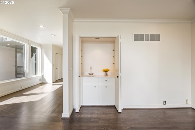 616 NW Westover Ter, Portland, OR 97210 - corridor featuring a sink, dark wood-style flooring, crown molding, baseboards, and recessed lighting