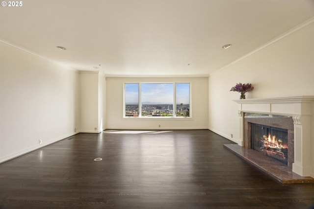 616 NW Westover Ter, Portland, OR 97210 - unfurnished living room featuring ornamental molding, wood finished floors, a high end fireplace, recessed lighting, and baseboards