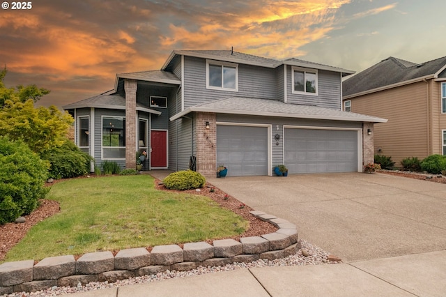 7874 Jani Ct NE, Keizer, OR 97303 - view of front of home with driveway, a lawn, an attached garage, and brick siding