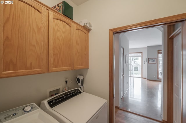7874 Jani Ct NE, Keizer, OR 97303 - laundry area featuring washer and clothes dryer, cabinet space, and light wood-style flooring