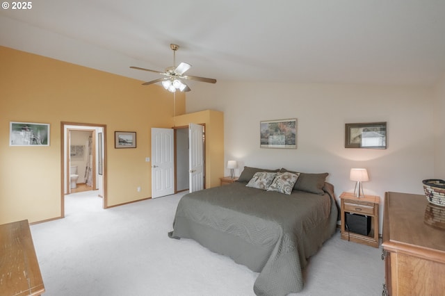 7874 Jani Ct NE, Keizer, OR 97303 - bedroom with vaulted ceiling, light carpet, ensuite bathroom, a ceiling fan, and baseboards