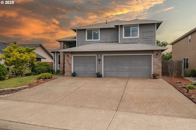 7874 Jani Ct NE, Keizer, OR 97303 - view of front of home featuring a garage, brick siding, driveway, and a shingled roof