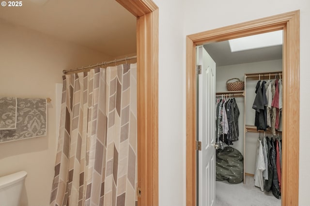 7874 Jani Ct NE, Keizer, OR 97303 - full bathroom with toilet, a walk in closet, and a shower with curtain