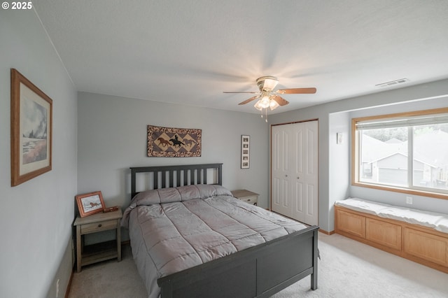 7874 Jani Ct NE, Keizer, OR 97303 - bedroom with light colored carpet, a closet, and a ceiling fan