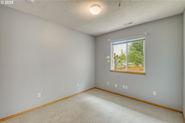 5200 NW 168th Pl, Portland, OR 97229 - carpeted spare room featuring baseboards and a textured ceiling