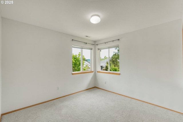 5200 NW 168th Pl, Portland, OR 97229 - spare room with baseboards and carpet