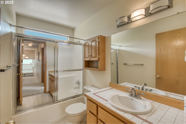 5200 NW 168th Pl, Portland, OR 97229 - full bath with vanity, toilet, and shower / bath combination with glass door