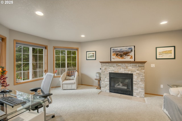 5200 NW 168th Pl, Portland, OR 97229 - home office with carpet flooring, recessed lighting, baseboards, and a stone fireplace