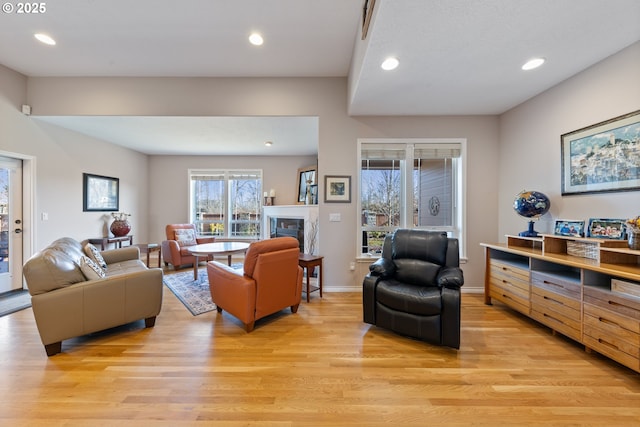 living room with light hardwood / wood-style floors