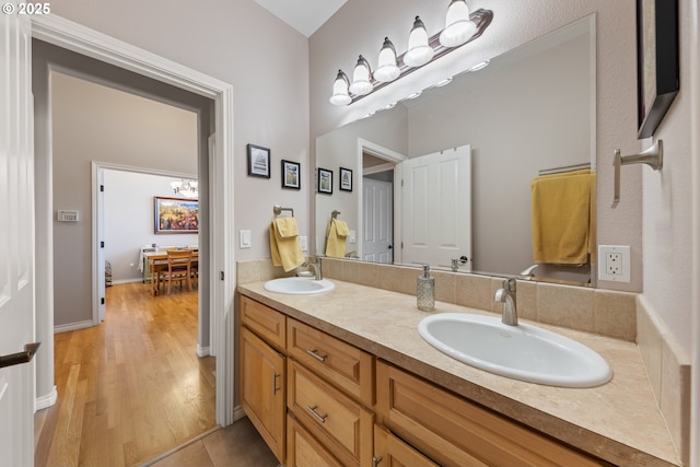 bathroom featuring vanity and wood-type flooring