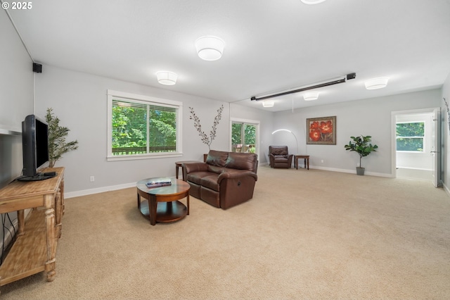 7540 SW Becky Ct, Beaverton, OR 97007 - living room with carpet, healthy amount of natural light, and baseboards