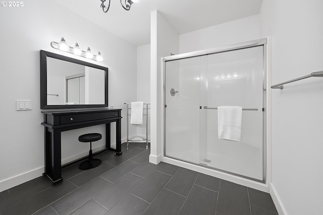 7540 SW Becky Ct, Beaverton, OR 97007 - full bathroom with a stall shower and baseboards