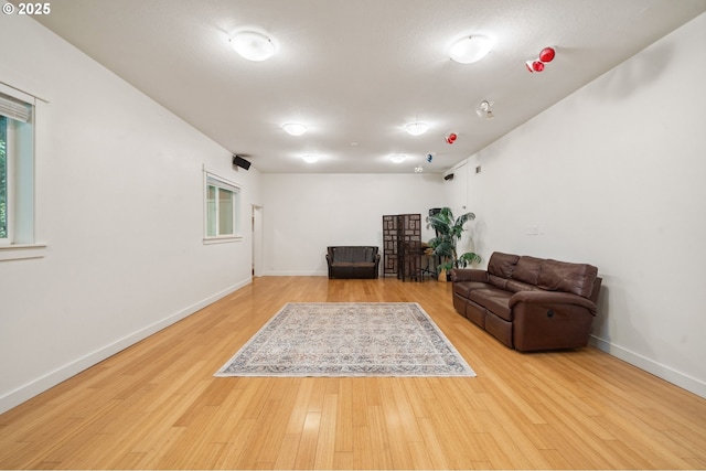 7540 SW Becky Ct, Beaverton, OR 97007 - living area featuring wood finished floors and baseboards