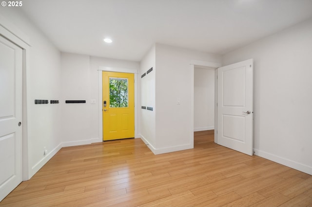 7540 SW Becky Ct, Beaverton, OR 97007 - foyer with light wood-style floors, baseboards, and recessed lighting