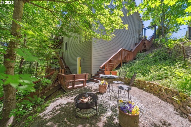 7540 SW Becky Ct, Beaverton, OR 97007 - view of patio / terrace featuring stairway and a fire pit